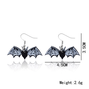 Detail view of bat wing earrings with specific dimensions 3.5x4.5cm and weight 2.6g