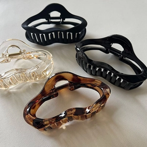 Set of four large hollow cloud hair claws in matte black, glossy black, clear and leopard print