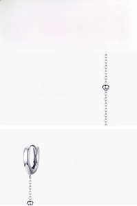 Polished S925 sterling silver earring detail with delicate tassel chain and hoop