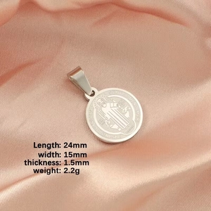 Silver geometric round cross pendant in stainless steel shown with exact measurements