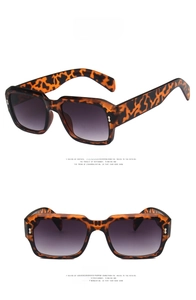 Detail view of leopard print frames with grey gradient lenses from front and side angles