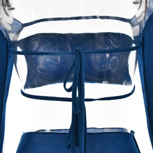 Detail of blue long sleeve top featuring an open back design with tie-up fastenings
