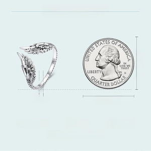 Detailed size comparison of S925 sterling silver wing feather ring with a coin