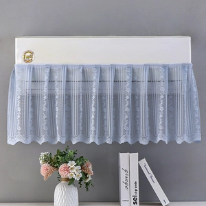 Detail of light blue lace air conditioner dust cover with elegant wavy scalloped edge