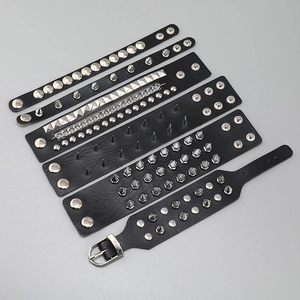 Set of six punk rock black leather bracelets with silver metal spikes and rivets