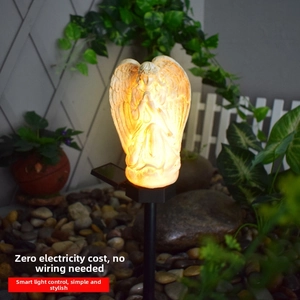 Solar powered angel garden statue with warm LED light and outdoor ground stake