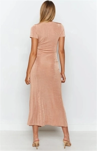 Elegant back view of champagne long dress with shimmering fabric and V-neck cut