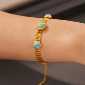 Vintage mesh chain bracelet with turquoise charms and Roman numerals in gold finish