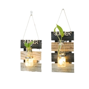 Jarrones hidropónicos de pared en vidrio con soporte de madera y luces LED cálidas