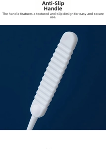Detail of white mini cleaning brush with ergonomic non-slip grooved handle design