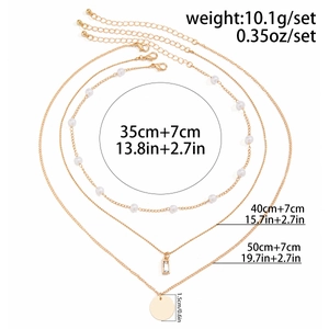 Detailed view of 3-layer gold necklace set showing measurements and textures
