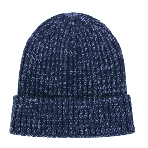 Close-up of navy blue ribbed knit beanie with white flecked yarn and folded brim