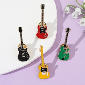 Detailed set of four colorful electric guitar enamel pins with metallic accents