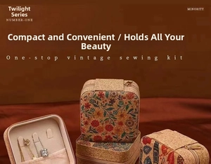 Detail view of vintage cork jewelry box with floral prints and interior storage hooks