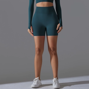 Detailed close-up of teal high-waisted seamless yoga shorts with a wide ribbed waistband