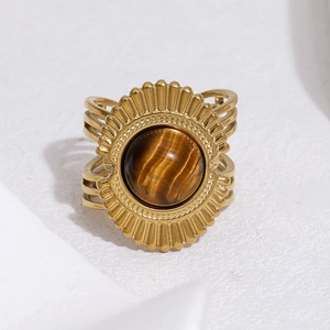 Macro shot of 18k gold plated stainless steel ring featuring vintage tiger eye stone