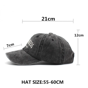 Vintage washed black cotton baseball cap with Fearless white embroidery and curved brim