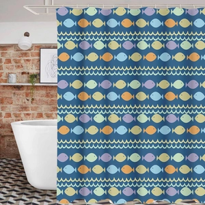 Detail of navy shower curtain with colorful fish patterns and wavy lines in a bathroom