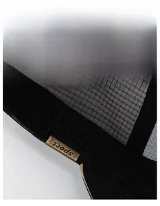 Detail of breathable mesh cap featuring widened sweatband and bronze sport metal logo