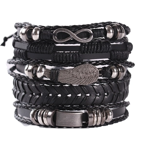 Multi-layer black leather bracelet set with wing charms and infinity symbol details