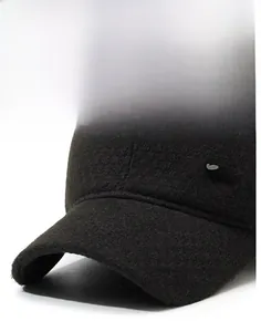 Detail shot of winter wool baseball cap with thick fabric texture and Fashion metal logo