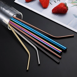 Colorful 304 stainless steel drinking straw set with straight and curved pipes on table