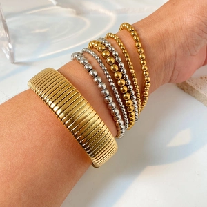 Elastic stainless steel bracelet set with 18K gold plating and silver beads for women