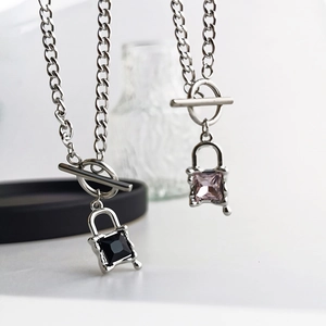 Silver OT buckle necklace with melting metal square pendants in black and pink gems