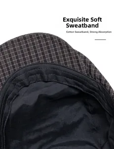 Close-up of retro plaid flat cap featuring soft cotton sweatband for moisture wicking