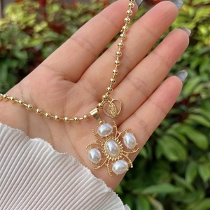 Vintage 18K gold plated beaded necklace with holy heart and pearl sun flower charms