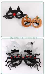 Detail of glitter Halloween eyewear set including pumpkin, ghost, cat, and spider felt frames