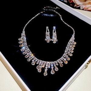 Detail of silver drop jewelry set with sparkling rhinestones in a luxury gift box
