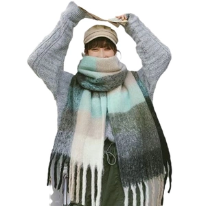 Rainbow striped thick knit scarf for women featuring gradient colors and long fringe tassels