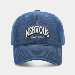 Vintage blue washed denim baseball cap with white Nervous and make peace embroidery