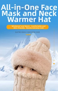 Detail of khaki cable knit hat with fluffy fur pom-pom and thick fleece lining in snow