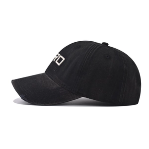 Macro detail of high-quality cotton baseball cap featuring vintage 3D embroidery
