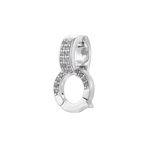 Macro view of silver figure-eight connectors with cubic zirconia for jewelry making