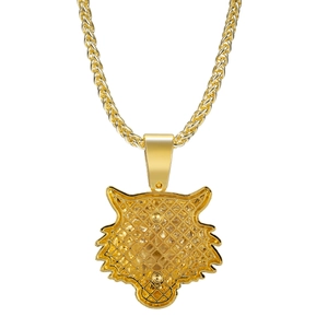 Macro detail of the textured back design on the golden tiger head hip hop pendant