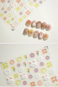 Detailed relief nail art stickers featuring cute bunny and tulip patterns in pastel colors