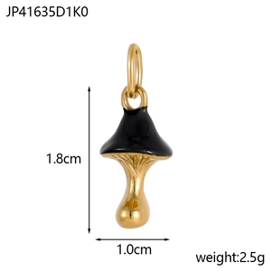 Detail view of gold mushroom pendant with black enamel, showing 1.8cm height and 1.0cm width