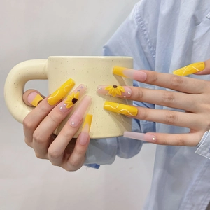Handmade yellow sunflower long ballerina press-on nails with 3D floral art and rhinestones
