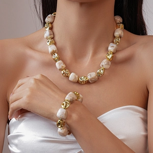 Irregular acrylic beads necklace and bracelet set in beige marble and gold finish