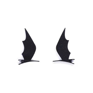 Close-up of black felt bat wing hair clips for Halloween party and cosplay costumes