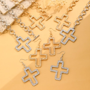 Gold and silver hollow cross necklace and earring set with chunky textured chains