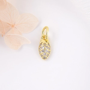 Gold strawberry pendant with white zircons for DIY jewelry making on white background
