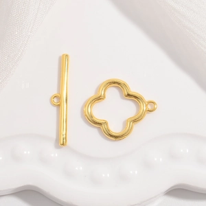 Close-up of golden S925 sterling silver clover OT toggle clasp for DIY jewelry making