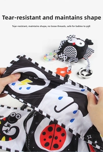 Close-up of durable baby cloth book showing strong tear-resistance and high contrast patterns