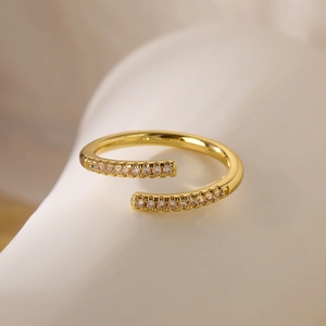 Detailed close-up of 18K gold plated adjustable ring with sparkling zircon stones