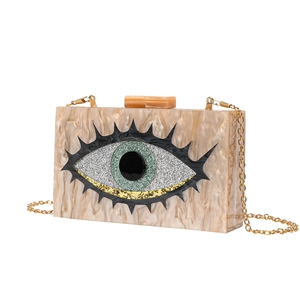 Pochette da sera in acrilico con motivo a occhio di paillettes e catena d'oro