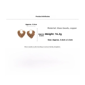 Detail view of heart-shaped beaded earrings showing 3.6x3.3cm size and luxury texture